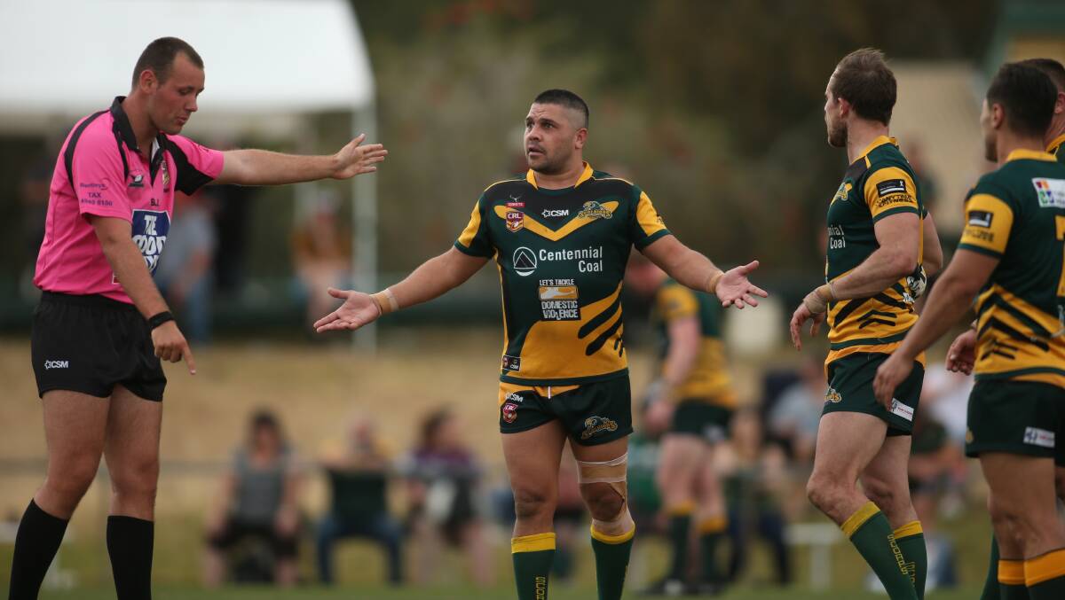 INFRINGEMENT: Newcastle Rugby League referee Tom Taylor (left) blows a penalty last season. Picture: Max Mason-Hubers