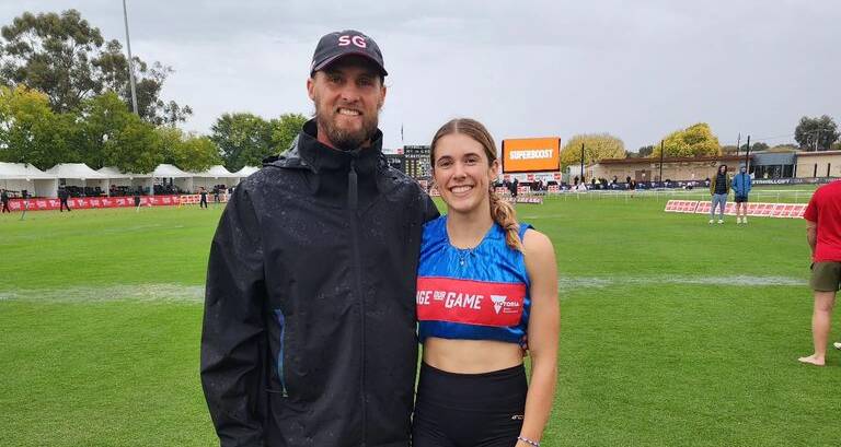 Newcastle Runners squad member Jemma Pollard (right) and coach Tim Eschebach at the recent Stawell Gift. Picture via Facebook