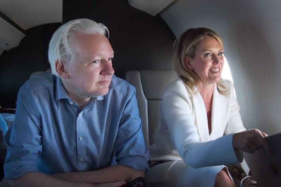 Julian Assange and Jennifer Robinson en route in a chartered plane last week. Picture Facebook/Benny Wenda