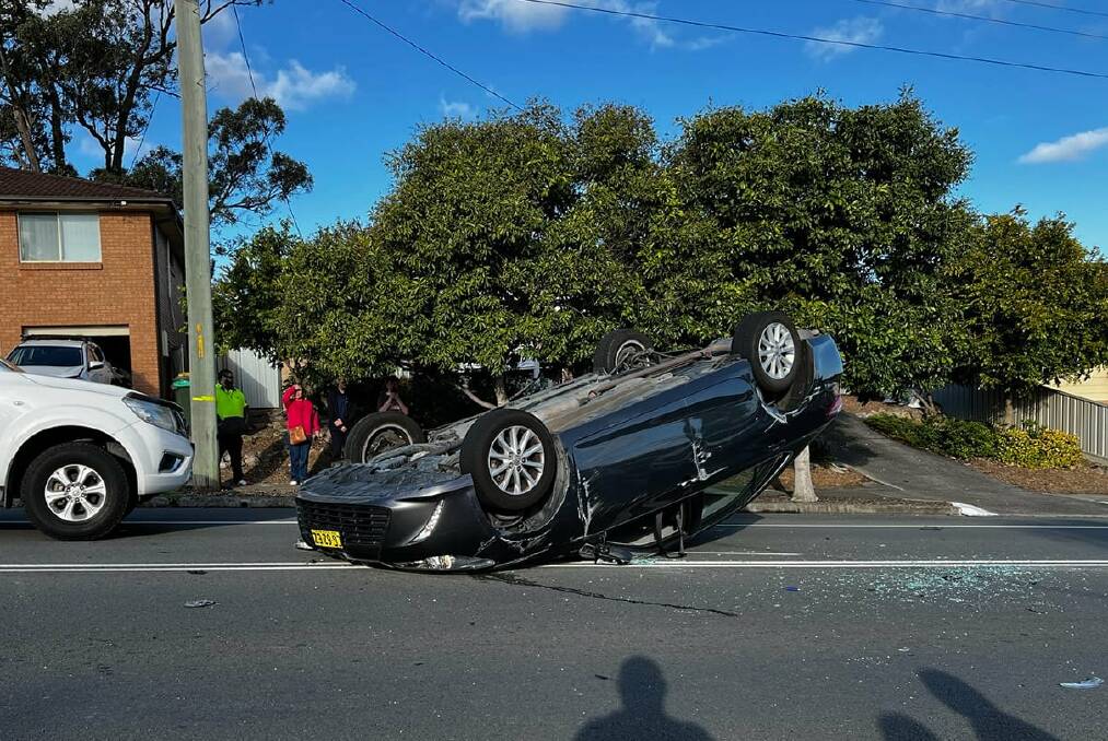 Traffic came to a half on Minmi Road this afternoon after a car flipped and landed on its roof. Picture supplied Nu Focus Photography