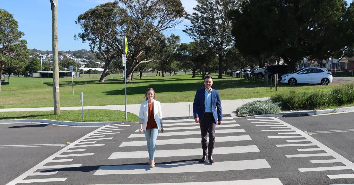 Councillor Elizabeth Adamczyk and deputy lord mayor Declan Clausen using a pedestrian crossing at New Lambton. Picture supplied 