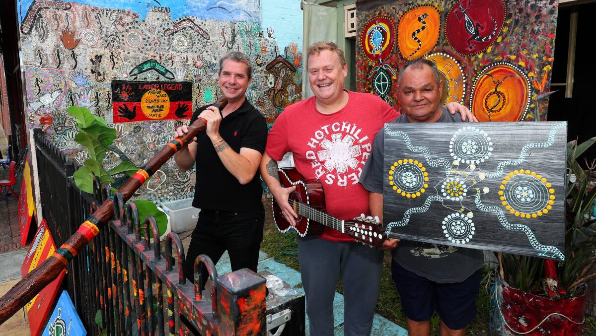 Petition creator Michael Hislop, supporter Damien Freeman and Wiradjuri artist Uncle Billy Lamb at his home in Carrington. Picture by Peter Lorimer 