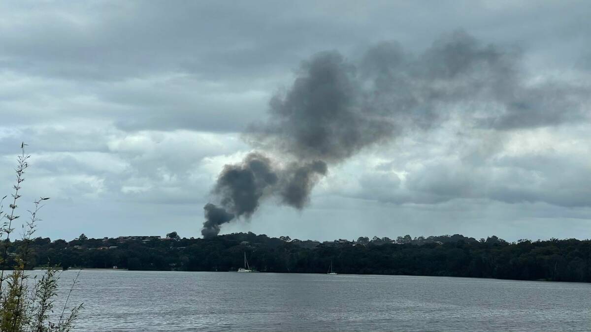 Firefighters have rushed to the scene of a house fire on Somersham Avenue. The photo shows smoke billowing from the blaze, taken from the Killaben Bay waterfront. Picture supplied by Ivan Bonus.