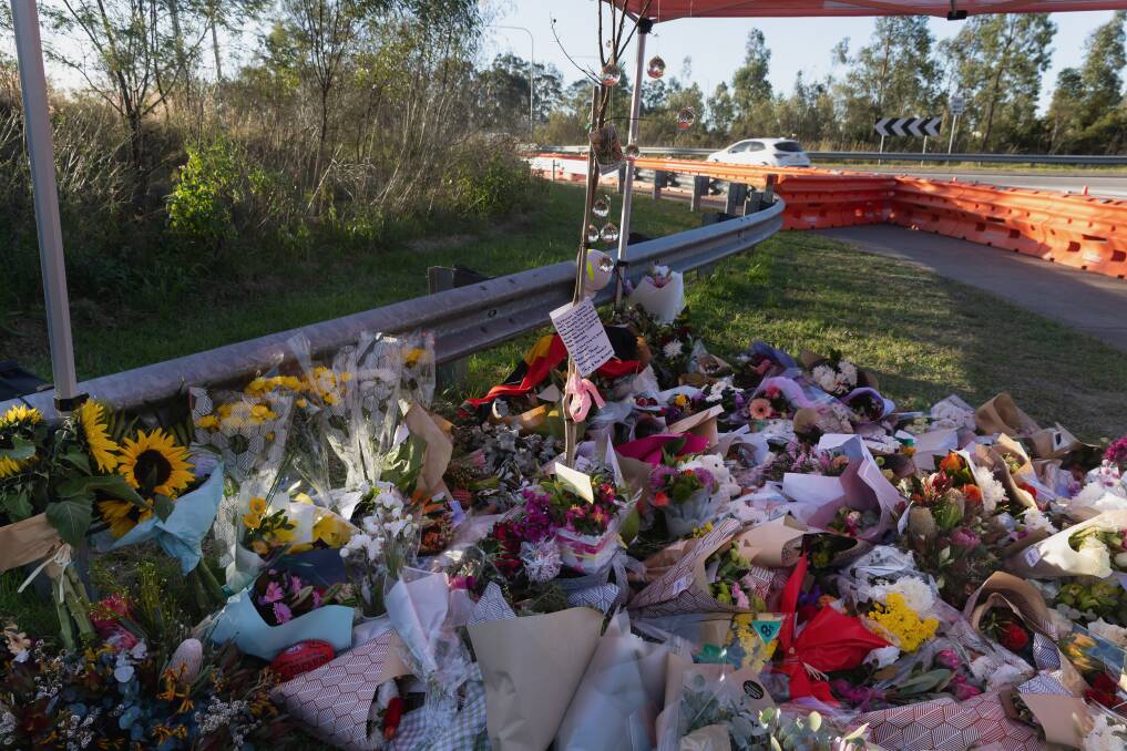 Flowers left in tribute at the crash scene on Thursday. Picture by Marina Neil