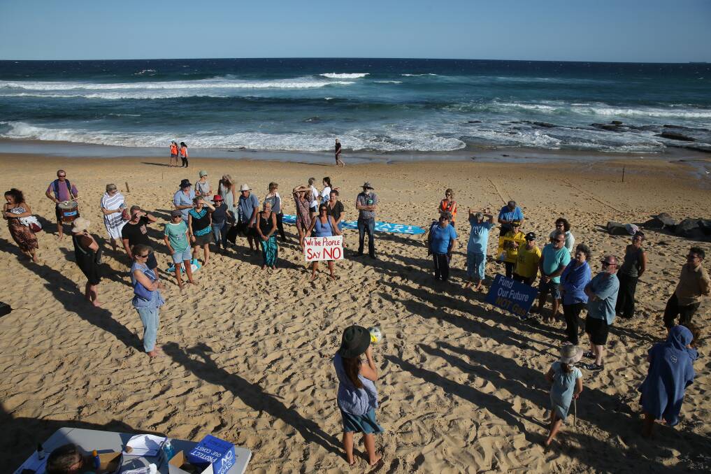 Protesters at Bar Beach in 2021 calling for an end to the PEP-11 offshore gas exploration licence.