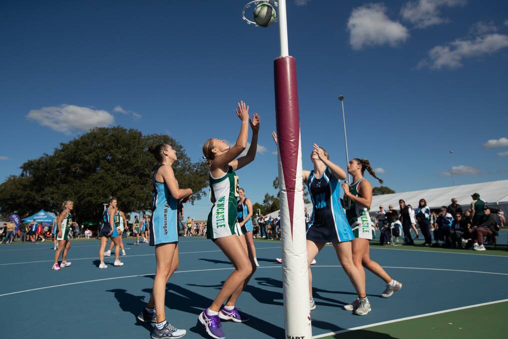 Newcastle men's and women's championship teams in action at Maitland on Saturday. Pictures by Jonathan Carroll