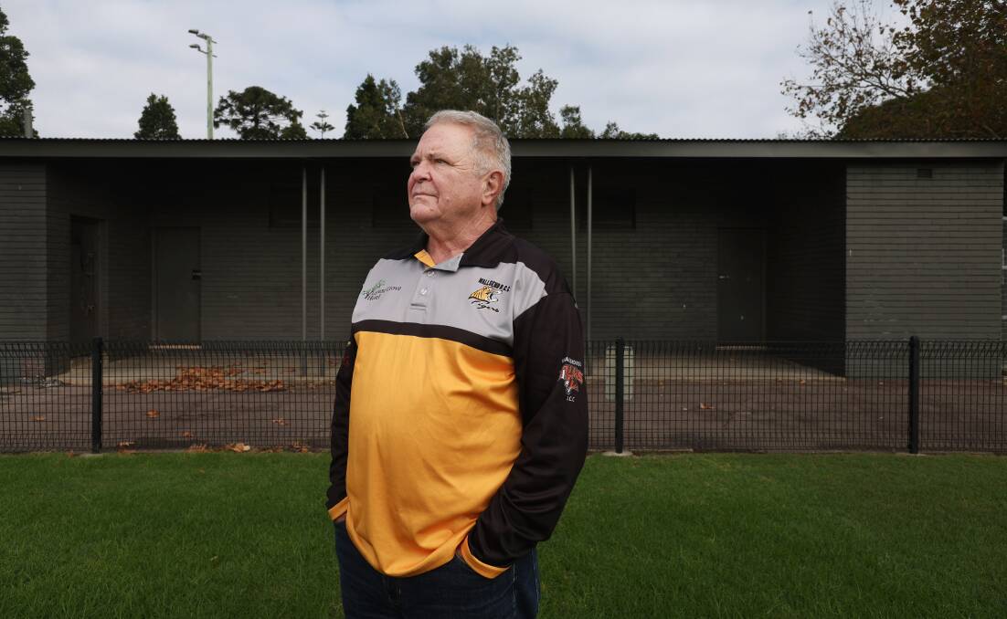 Wallsend District Cricket Club president Peter Hanna in front of Wallsend Oval's outdated changeroom facilities. Picture by Simone De Peak