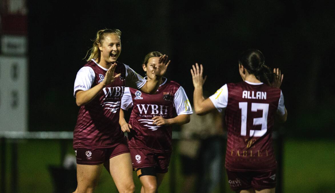 Tara Andrews celebrates one of many goals with Lauren Allan for Warners Bay in NPLW NNSW last year. Picture by Marina Neil