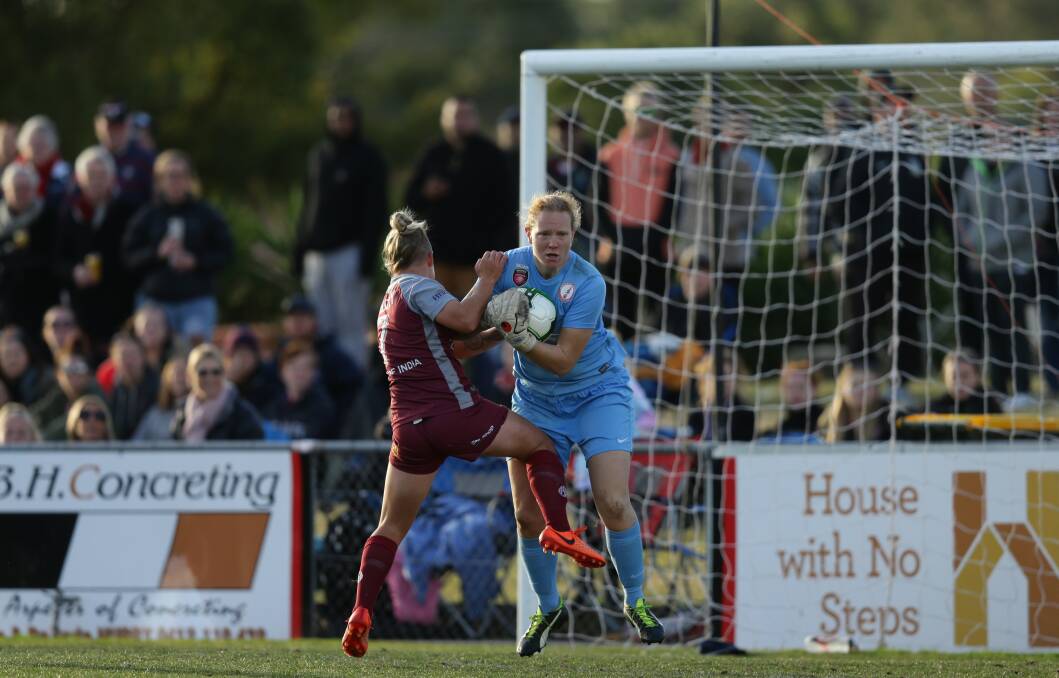 GAME-CHANGER: Goalkeeper Alison Logue, pictured in last year's Herald Women's Premier League grand final, has been key to Merewether's success this year. Picture: Jonathan Carroll