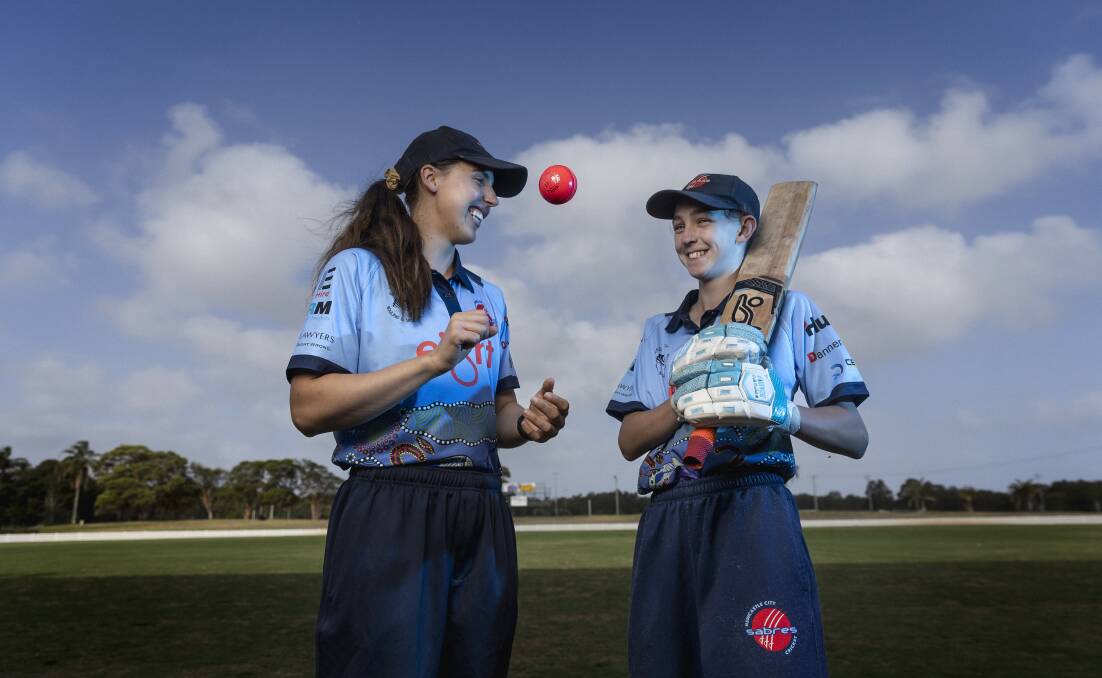 Newcastle captain Kirsten Smith, 24, with Newcastle City teammate and Blasters debutante Felicity Wharton, 14, ahead of the NSW Country Bash. Picture by Marina Neil
