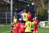 Broadmeadow goalkeeper Lewis Alvarez punches the ball away against Lambton at Arthur Edden Oval on Saturday. Picture by Sproule Sports Focus
