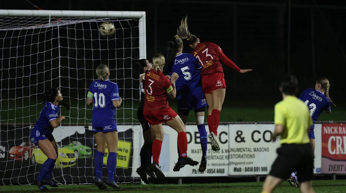 Chelsea Lucas scores the opening goal as Broadmeadow beat Olympic 3-1 at Magic Park on Friday night. Picture by Sproule Sports Focus