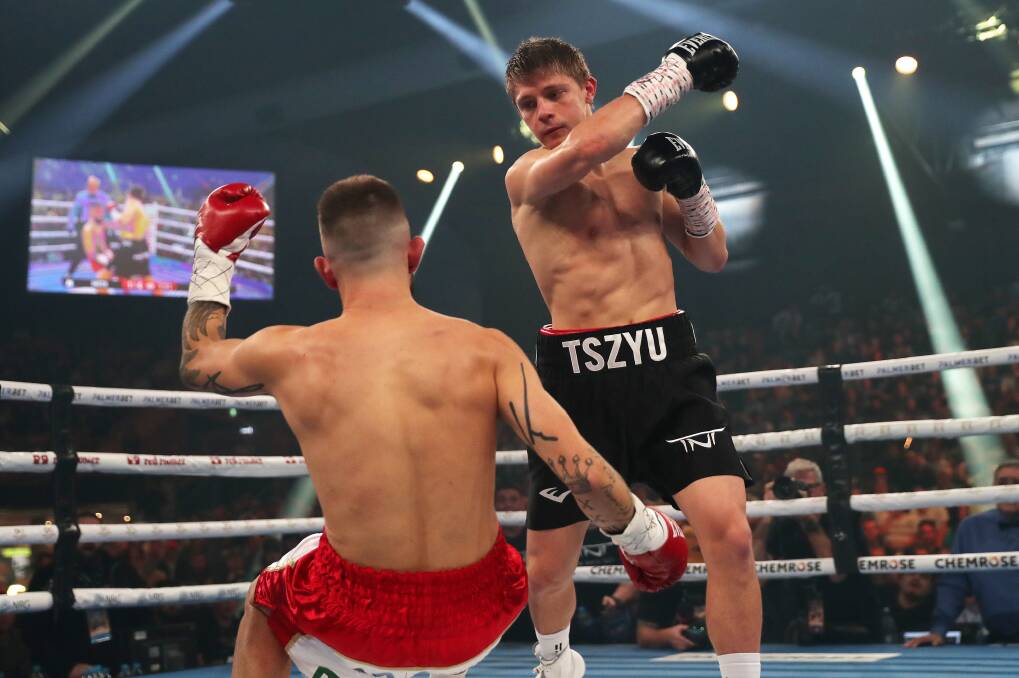 Tszyu knocks down Mason Smith at Newcastle Entertainment Centre in May, 2022. Picture by Peter Lorimer 