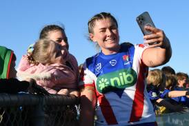 Sheridan Gallagher mingles with fans following Newcastle's pre-season trial in Wagga Wagga. Picture by Bernard Humphreys