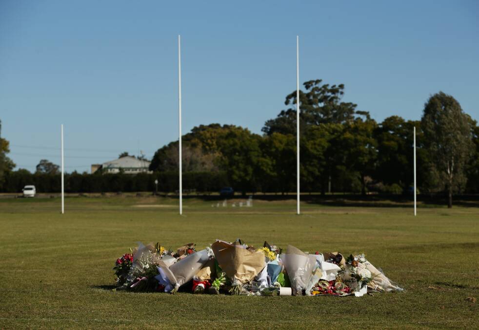 A floral tribute at Singleton's home ground following the crash. Picture by Simone De Peak