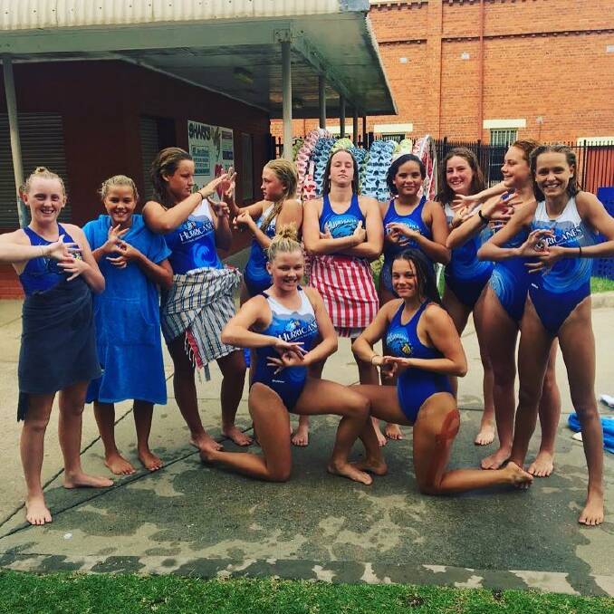 HAVING FUN: The Hunter Hurricanes under 14's girls water polo team at the National Aged Club Championships in Albury-Wodonga. 