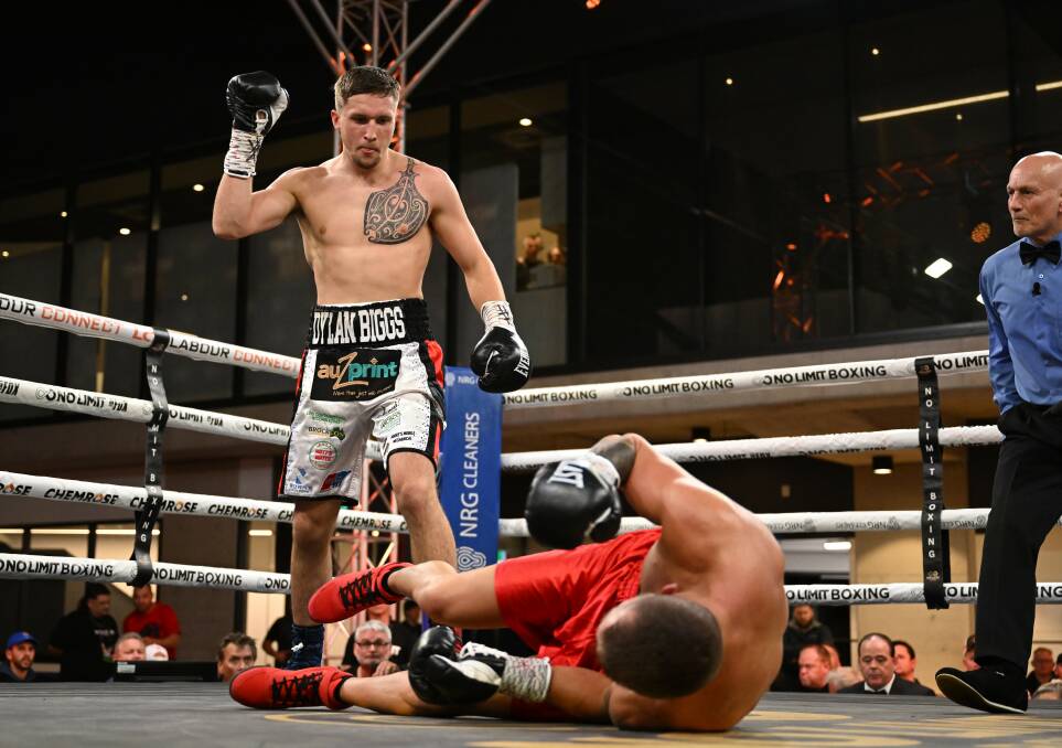 Dylan Biggs puts Ryan Mitchem on the canvas in his most recent fight. Picture supplied