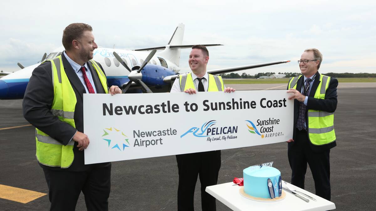 UP AND AWAY: FlyPelican CEO Marty Hawley, left, and Newcastle Airport CEO Dr Peter Cock, right, at a ceremony before the first flight. Picture: Simone De Peak