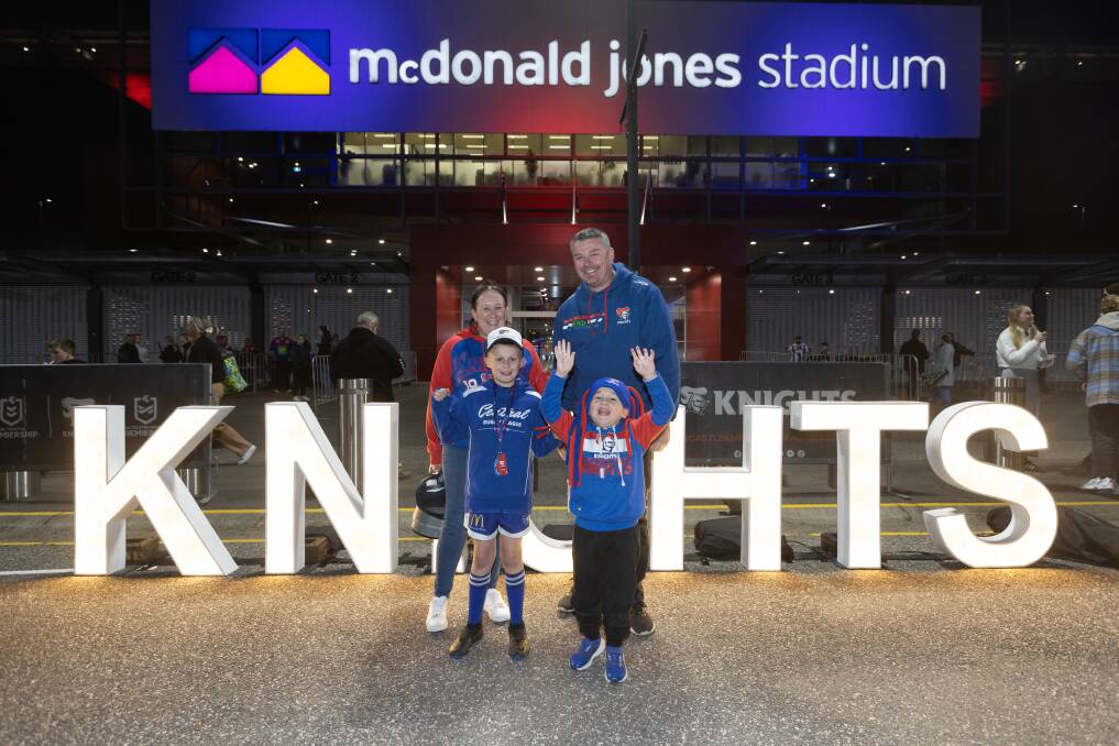 Kirstey and Michael Wilcher with their boys Chase and Mason at McDonald Jones Stadium on Thursday night, July 25. Picture by Jonathan Carroll 