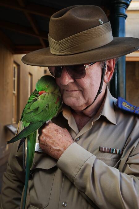 Fort Scratchley secretary Rick Carter with Wing Commander Lynyrd Skynyrd (Free bird squadron) share a bonding moment on Thursday afternoon. Picture by Simone De Peak