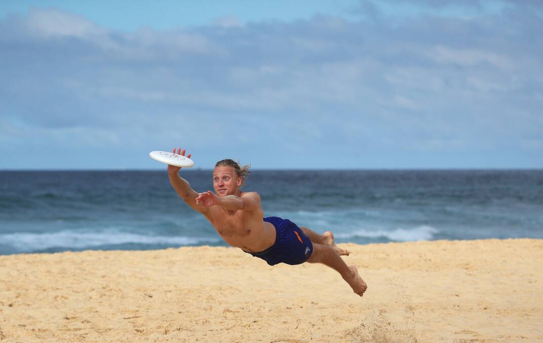 Luke Prosser in training at Newcastle Beach for the World Beach Ultimate Club Championships in October. Picture by Peter Lorimer