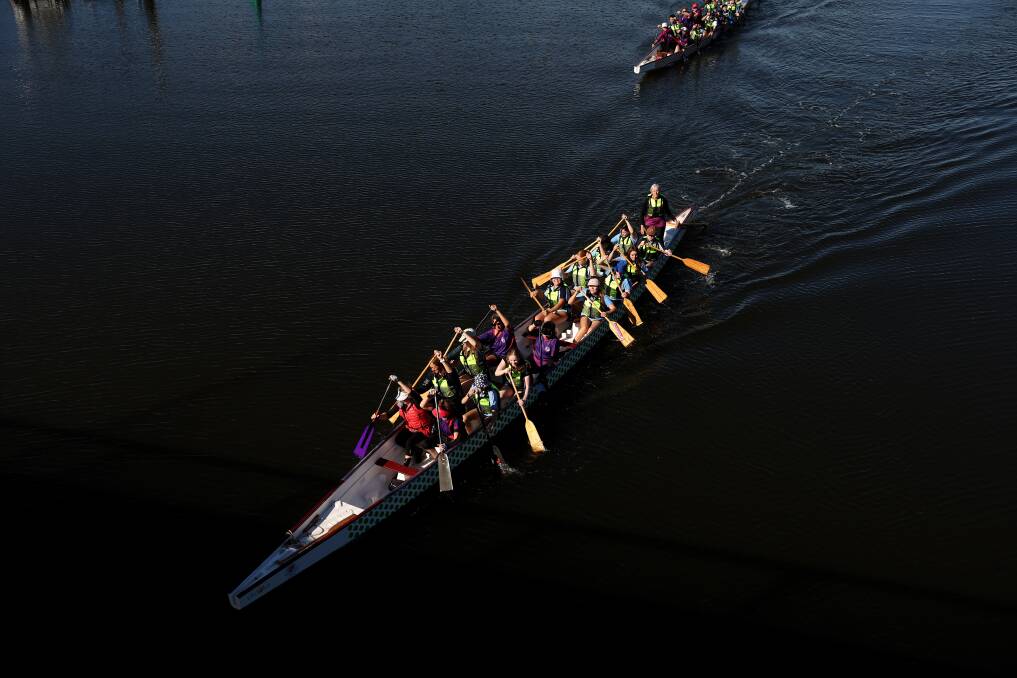 A dragon boat passed under the bridge to Carrington. Picture by Peter Lorimer 