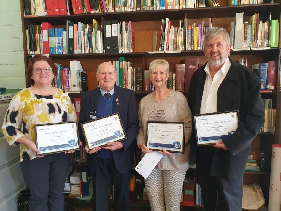 Alison Eaton, Kevin Goodwin, Pamela Ellen and Ron Robinson honoured for their combined near-century of service to the Lambton Mechanics Institute. Picture supplied
