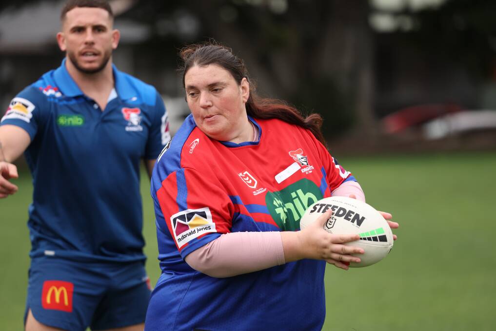 Bec Whitney runs a drill at Friday's Game Changer workshop under the guidance of NRL stars Adam and Millie Elliott. Picture by Peter Lorimer