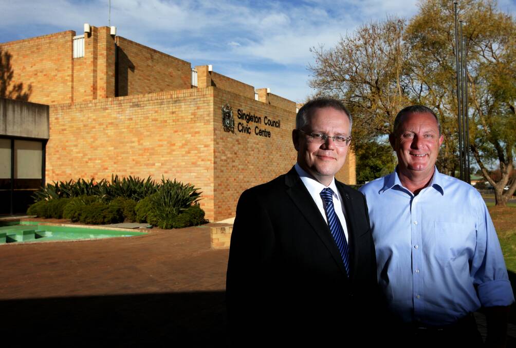 Campaign: Upper Hunter MP Michael Johnsen campaigning in 2013 with the then Immigration Minister Scott Morrison. Mr Johnsen faces a preselection challenge on November 10. 