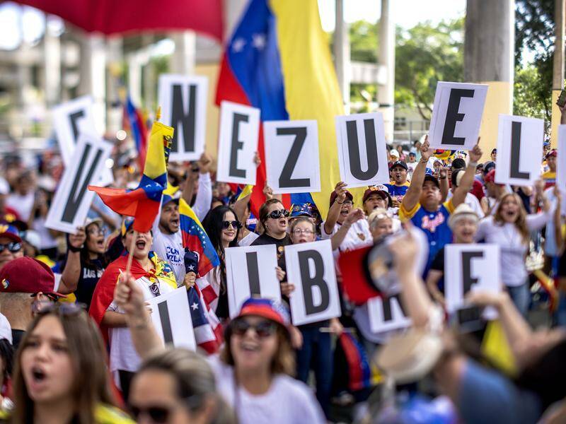 Venezuelan nationals living in Miami, Florida, rallied on election day to call for change. Photo: EPA PHOTO