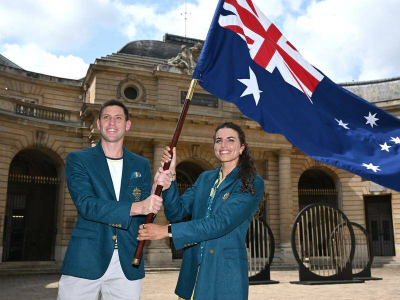 Australian flag bearers Jessica Fox and Eddie Ockenden will be straight into the action on day one. Photo: Dave Hunt/AAP PHOTOS