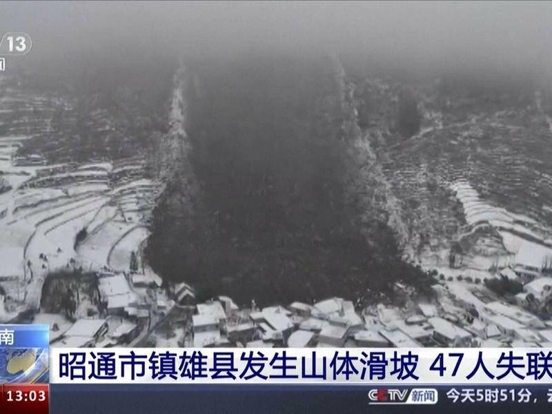 A landslide that struck Liangshui village in China's Yunnan province has killed at least 25 people. (AP PHOTO)