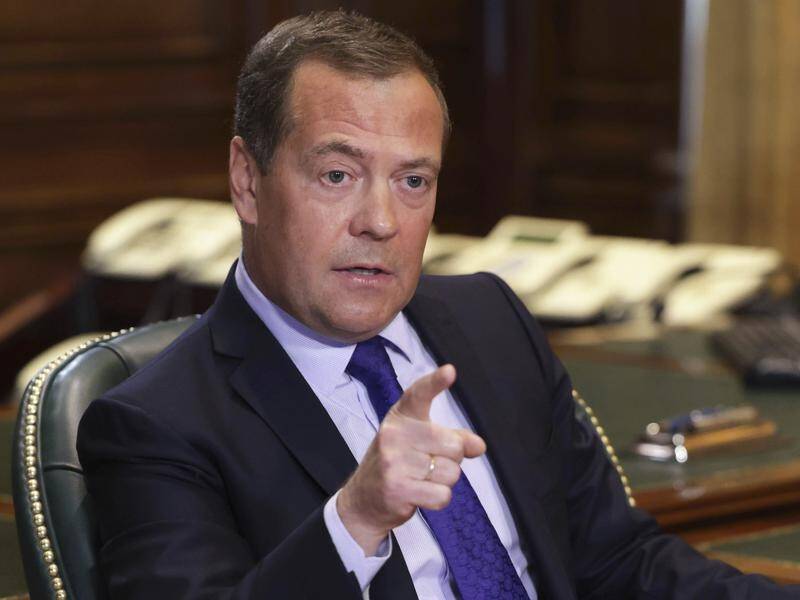 Russia's Security Council deputy head Dmitry Medvedev says Moscow wants Ukraine demilitarised. (AP PHOTO)