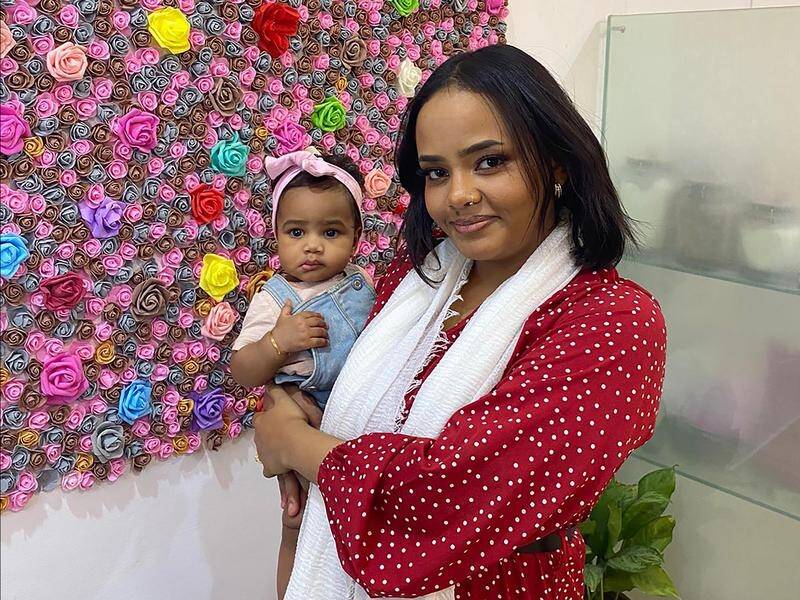 Amal Osman, with eight-month-old daughter Elan, is desperate to leave war-torn Sudan for Australia. (PR HANDOUT IMAGE PHOTO)