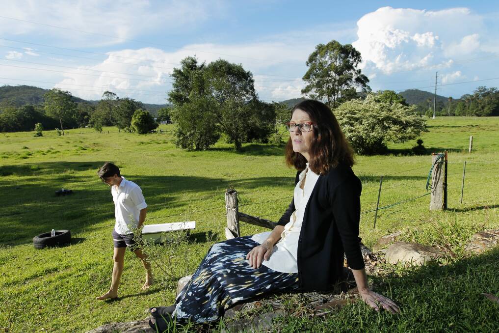 Beth Bolte, with her son Damian, looks over the family’s land.  Picture: Max Mason-Hubers