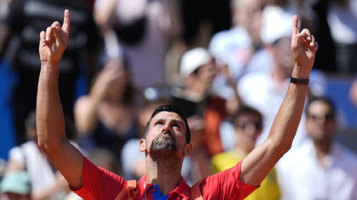 Novak Djokovic gestures to the crowd after his win over Rafael Nadal. (AP PHOTO)
