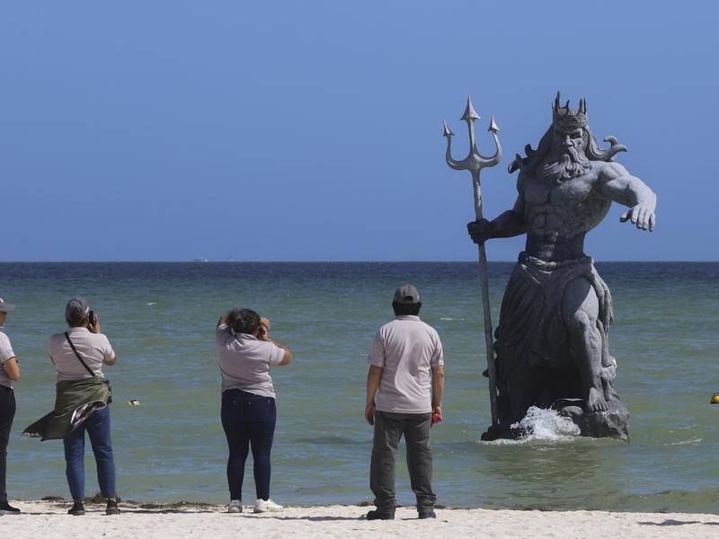 Yucatan residents say local god Chaac should be represented, not the Greek deity Poseidon. (AP PHOTO)