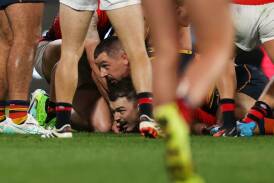 Essendon's Sam Draper in the controversial last-second tackle against the Crows in round six. Photo: Matt Turner/AAP PHOTOS