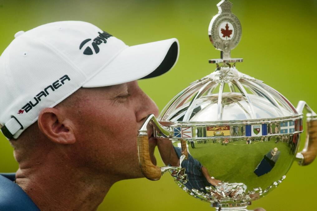 MONEY TRAIL: Nathan Green  winning the Canadian Open in 2009.  He will return home after 10 years on the US golfing circuit. 