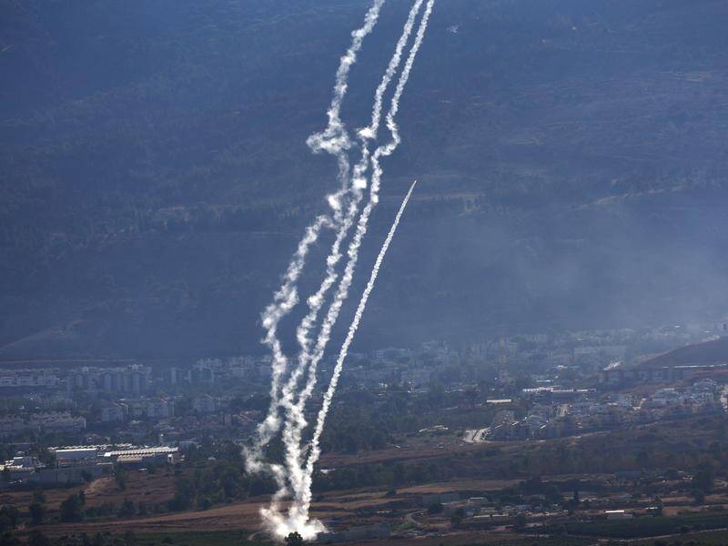 Israeli air defences and fighter jets scrambled to intercept hundreds of Hezbollah rockets. (EPA PHOTO)