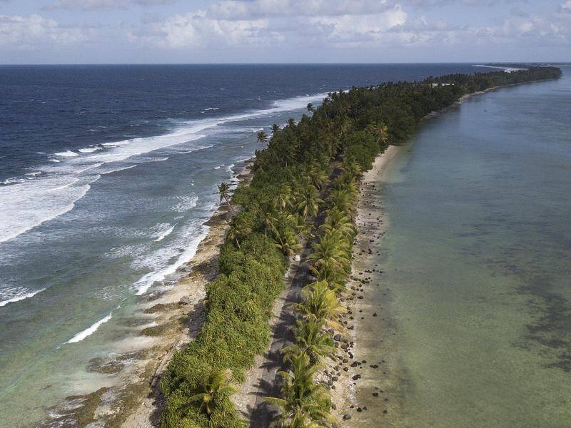 Australia has helped to deliver Tuvalu's first undersea telecommunications cable. (Mick Tsikas/AAP PHOTOS)