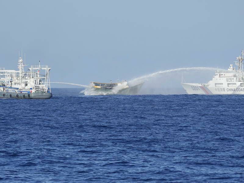 A Philippine vessel hit by two Chinese coastguard water canons in the South China Sea. Photo: AP PHOTO