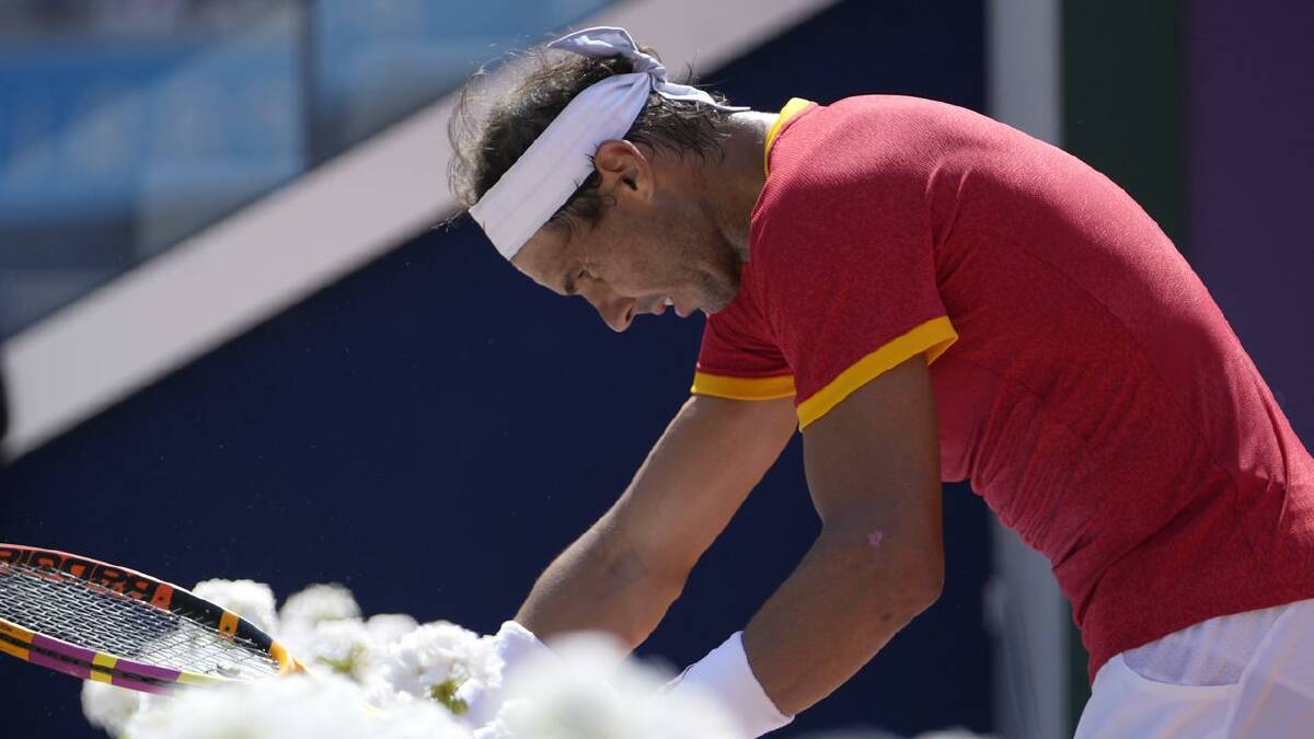 Rafael Nadal did it tough for much of his loss to Novak Djokovic. (AP PHOTO)