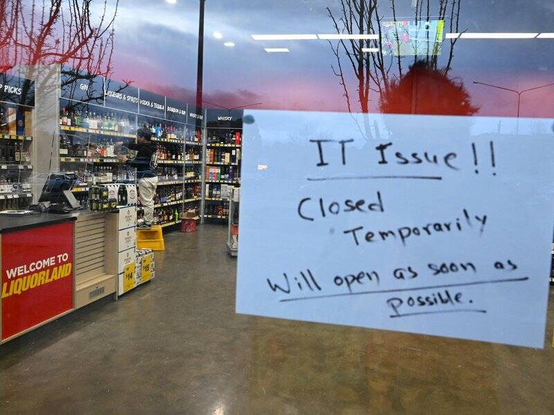 The IT outage is forcing businesses to close their doors early on Friday. Photo: Lukas Coch/AAP PHOTOS