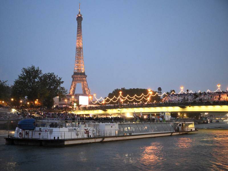 Australia make their way on the River Seine to the opening ceremony of the Paris Games. Photo: Joel Carrett/AAP PHOTOS
