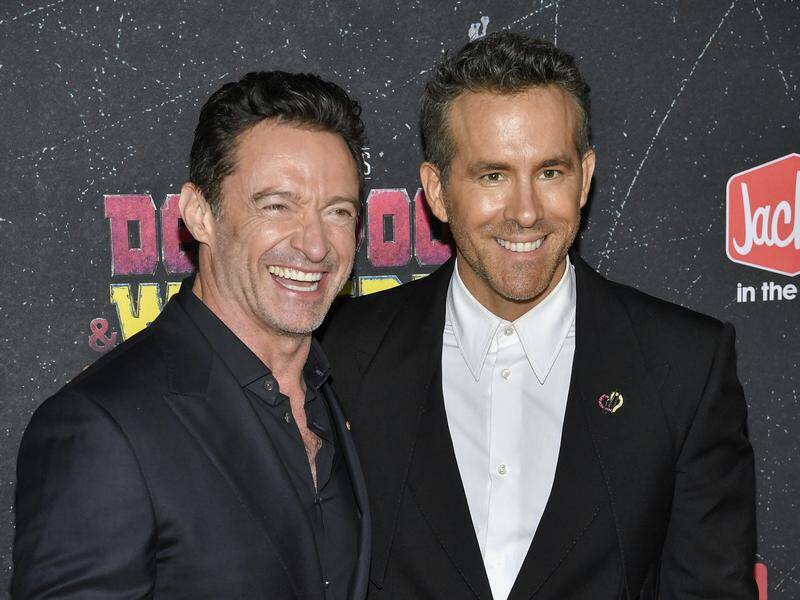 Hugh Jackman and Ryan Reynolds filled in as guest co-hosts on Jimmy Kimmel Live. Photo: AP PHOTO