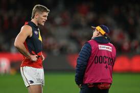 Crows' Nick Murray, who was subbed out with a knee injury, has not suffered another ACL rupture. Photo: James Ross/AAP PHOTOS