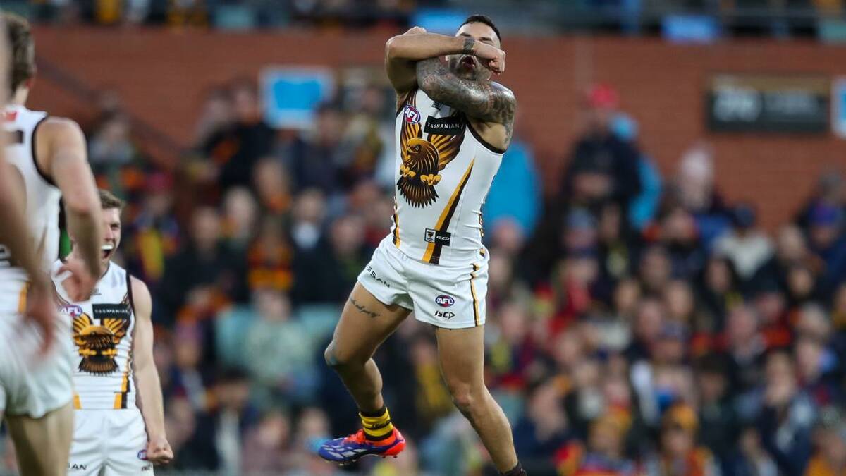 Surging Hawthorn's rampant celebrations continued, including this from Jarman Impey. (Matt Turner/AAP PHOTOS)