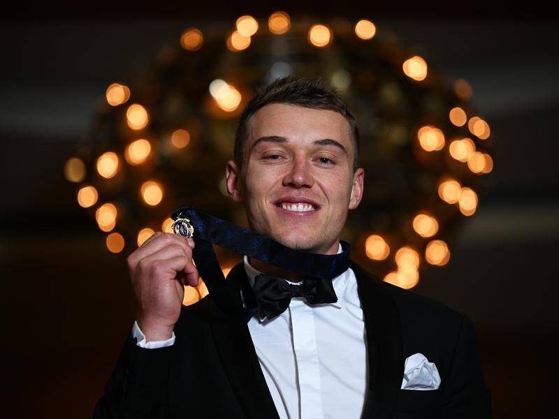 Patrick Cripps, the 2022 Brownlow Medallist, wants a review of the award's eligibility criteria (James Ross/AAP PHOTOS)
