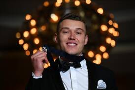 Patrick Cripps, the 2022 Brownlow Medallist, wants a review of the award's eligibility criteria (James Ross/AAP PHOTOS)